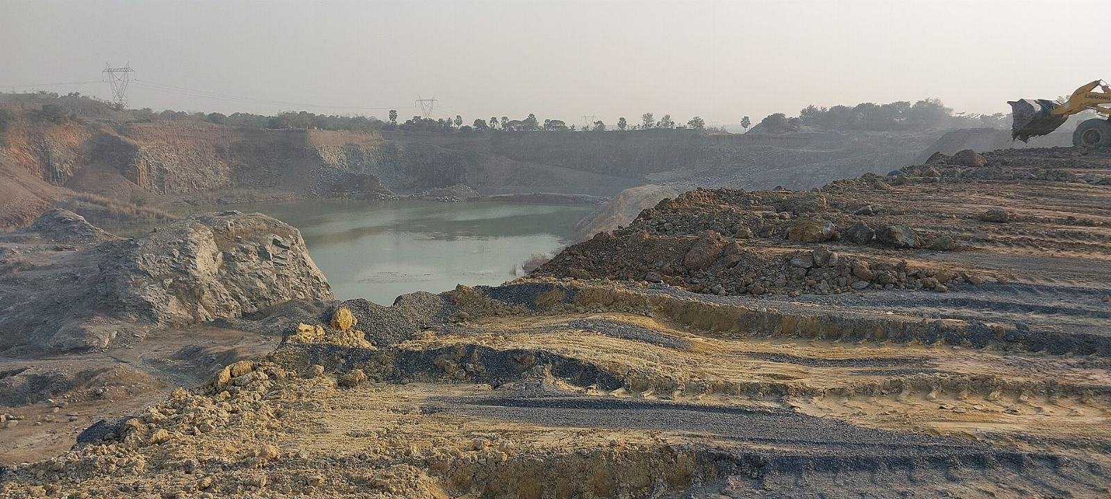 Stone crushing units along a haul road